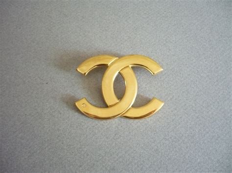 vintage chanel logo brooch|authentic Chanel brooches.